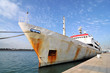 The ship docked at the pier