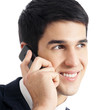 Businessman with cellphone, isolated