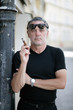 Photo: Mann raucht Zigarre Mann raucht Zigarre