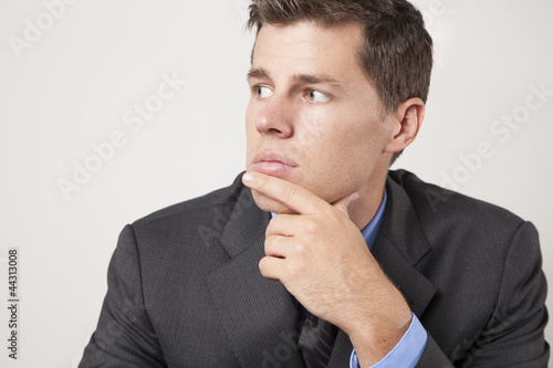 Photo: Young Executive Pondering Young Executive Pondering