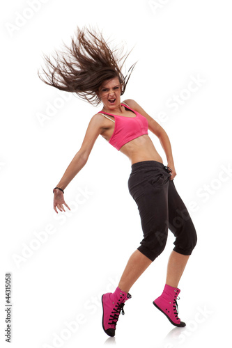 Photo: woman modern dancer on her toes, holdong her crotch woman modern dancer on her toes, holdong her crotch