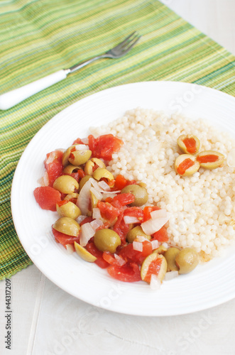 Photo: Stuffed olives and tomato salad with couscous Stuffed olives and tomato salad with couscous