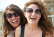 Two happy young beautiful women