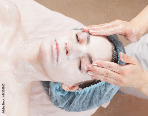 Photo: Beautiful woman with clear skin getting beauty treatment of her Beautiful woman with clear skin getting beauty treatment of her