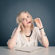 Photo: Young girl student with pile of books against dark background. Young girl student with pile of books against dark background.