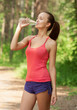 Photo: Fitness woman drinking water Fitness woman drinking water