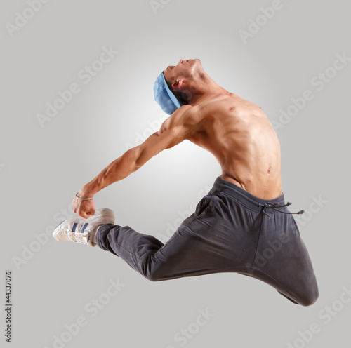 Photo: young man dancing hip hop young man dancing hip hop