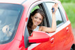 Photo: Happy driver in red car Happy driver in red car