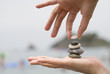  Gravel pile in hands 
