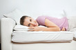 Photo: Woman Relaxing On Sofa Woman Relaxing On Sofa
