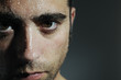 Closed portrait of a man with water drops 