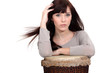 beautiful woman playing on traditional drums