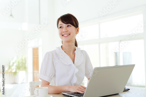 Photo: Beautiful young business woman Beautiful young business woman
