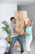 Couple with pile of cardboard