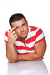 Portrait of handsome man posing in studio in t-shirt