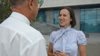 Video: conversation of two businesspeople on street conversation of two businesspeople on street