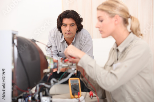 Photo: Female computer repair Female computer repair
