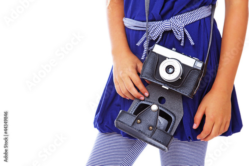 Photo: Close portrait of camera on whgite background Close portrait of camera on whgite background