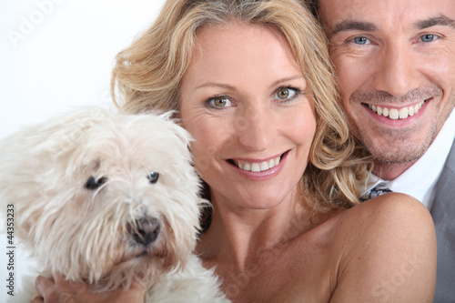 Photo: Couple with dog. Couple with dog.