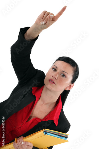 Photo: Businesswoman with her hand up Businesswoman with her hand up