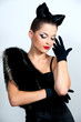 Beautiful woman with bow coiffure