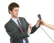 Photo: Concerned businessman refusing answer phone call Concerned businessman refusing answer phone call