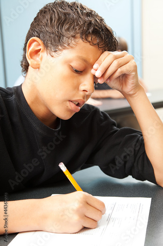 Photo: Struggling School Boy Struggling School Boy