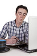 Foto: Businessman at His Desk Working Businessman at His Desk Working