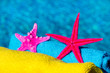 Starfish and towels