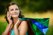Photo: woman in colorful dress of said cellular phone woman in colorful dress of said cellular phone