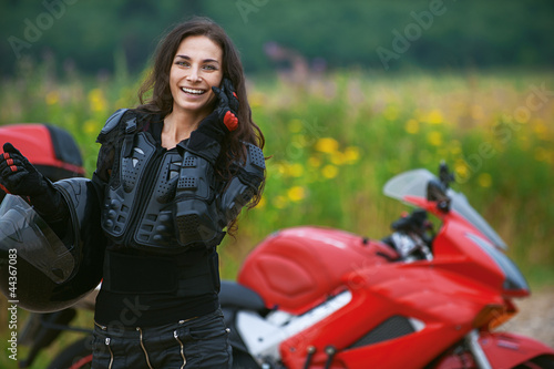Photo: woman rides nice bike woman rides nice bike
