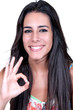 woman smiling doing the okay sign