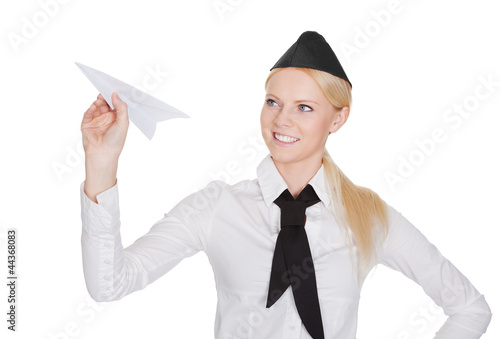Photo: Portrait of beautiful young stewardess Portrait of beautiful young stewardess