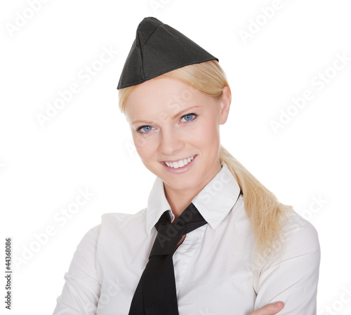 Photo: Portrait of beautiful young stewardess Portrait of beautiful young stewardess