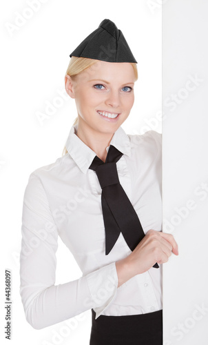 Photo: Portrait of beautiful young stewardess Portrait of beautiful young stewardess