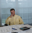 Senior man preparing USA tax form 1040 for 2012