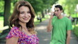 Video: Portrait of young happy woman in the park, steadicam shot Portrait of young happy woman in the park, steadicam shot