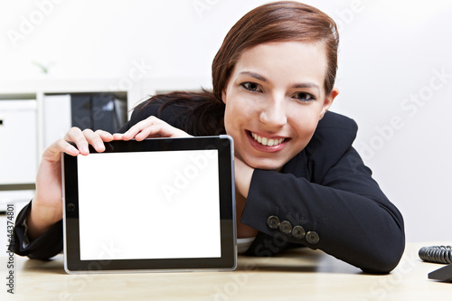 Photo: Frau präsentiert Tablet Computer Frau präsentiert Tablet Computer