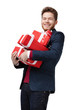 Foto: Young man carries a lot of presents, isolated on white Young man carries a lot of presents, isolated on white