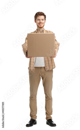 Photo: Deliveryman gives the parcel, isolated, white background Deliveryman gives the parcel, isolated, white background