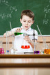 Little chemist holds scientific experiment