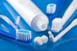 various toothbrushes and paste