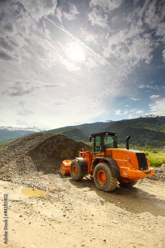 Photo: excavator in alps excavator in alps