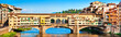 Panoramic view of Ponte Vecchio at sunset in Florence, Italy