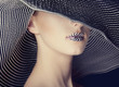 Foto: Fashion women in wide hat Fashion women in wide hat