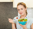 Photo: Young woman with salad Young woman with salad