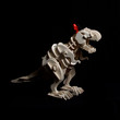 Toy dinosaur and red Lego figure