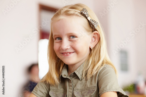 Photo: Little girl at school class Little girl at school class