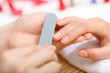 Foto: Woman is getting manicure Woman is getting manicure