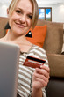 Photo: Beautiful young girl shopping online, e-commerce concept Beautiful young girl shopping online, e-commerce concept